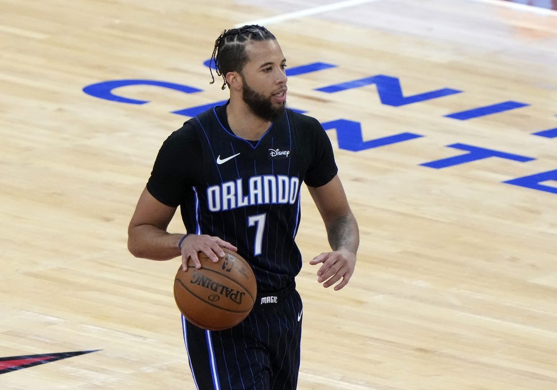 Apr 14, 2021; Chicago, Illinois, USA; Orlando Magic guard Michael Carter-Williams (7) dribbles the ball against the Chicago Bulls during the first quarter at the United Center. Mandatory Credit: Mike Dinovo-USA TODAY Sports