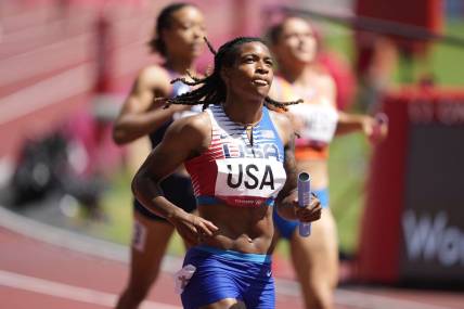 Aug 5, 2021; Tokyo, Japan; Aleia Hobbs (USA) crosses the finish line after competing in the women's 4x100m relay round 1 heat 1 during the Tokyo 2020 Summer Olympic Games at Olympic Stadium. Mandatory Credit: Andrew Nelles-USA TODAY Sports