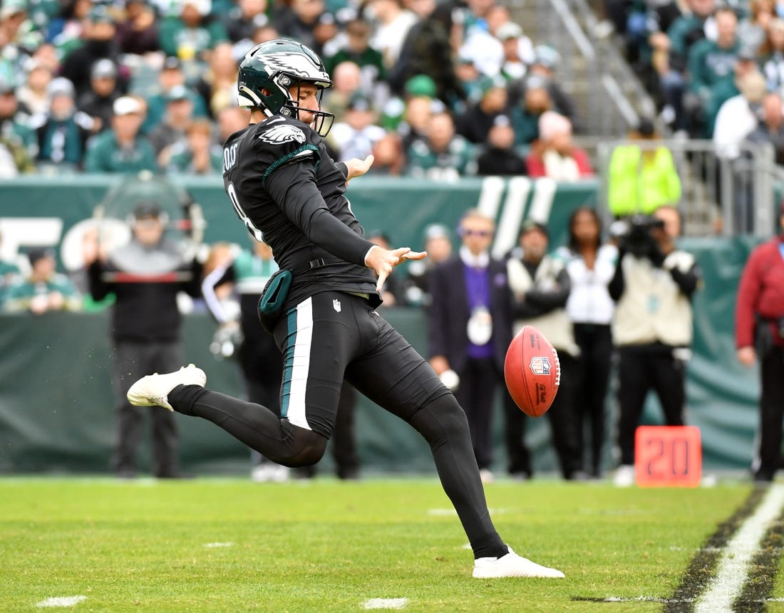 Nov 21, 2021; Philadelphia, Pennsylvania, USA; Philadelphia Eagles punter Arryn Siposs (8) punts against the New Orleans Saints at Lincoln Financial Field. Mandatory Credit: Eric Hartline-USA TODAY Sports