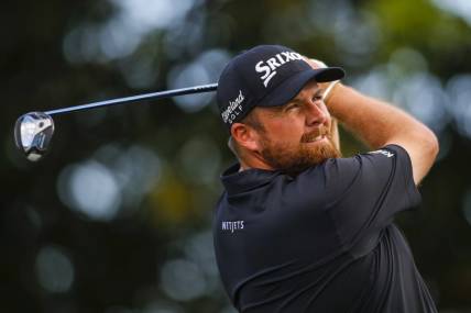 Feb 27, 2022; Palm Beach Gardens, Florida, USA; Shane Lowry plays his shot from the 14th tee during the final round of The Honda Classic golf tournament. Mandatory Credit: Sam Navarro-USA TODAY Sports