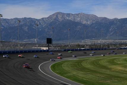 Feb 27, 2022; Fontana, California, USA; General view as NASCAR Cup Series driver Tyler Reddick (8) leads a group during the WISE Power 400 at Auto Club Speedway. Mandatory Credit: Gary A. Vasquez-USA TODAY Sports