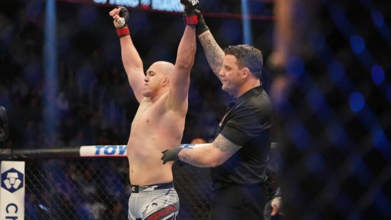 Mar 5, 2022; Las Vegas, Nevada, UNITED STATES; Serghei Spivac celebrates after defeating Greg Hardy (not pictured) during UFC 272 at T-Mobile Arena. Mandatory Credit: Stephen R. Sylvanie-USA TODAY Sports