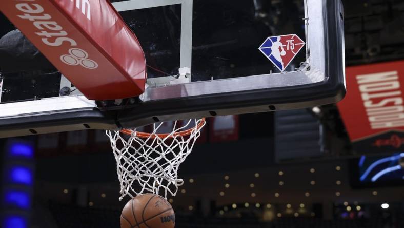 Mar 11, 2022; Houston, Texas, USA; General view of the NBA 75th anniversary logo on a backboard before the game between the Houston Rockets and the Dallas Mavericks at Toyota Center. Mandatory Credit: Troy Taormina-USA TODAY Sports