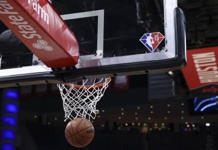 Mar 11, 2022; Houston, Texas, USA; General view of the NBA 75th anniversary logo on a backboard before the game between the Houston Rockets and the Dallas Mavericks at Toyota Center. Mandatory Credit: Troy Taormina-USA TODAY Sports