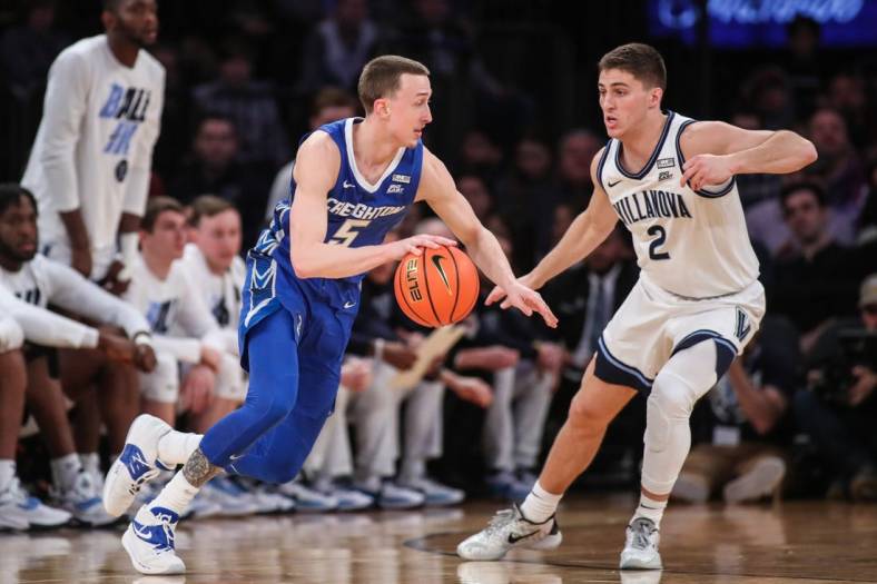 Mar 12, 2022; New York, NY, USA;  Creighton Bluejays guard Alex O'Connell (5) and Villanova Wildcats guard Collin Gillespie (2) at the Big East Tournament at Madison Square Garden. Mandatory Credit: Wendell Cruz-USA TODAY Sports