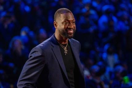 February 20, 2022; Cleveland, Ohio, USA; NBA great Dwyane Wade is honored for being selected to the NBA 75th Anniversary Team during halftime in the 2022 NBA All-Star Game at Rocket Mortgage FieldHouse. Mandatory Credit: Kyle Terada-USA TODAY Sports