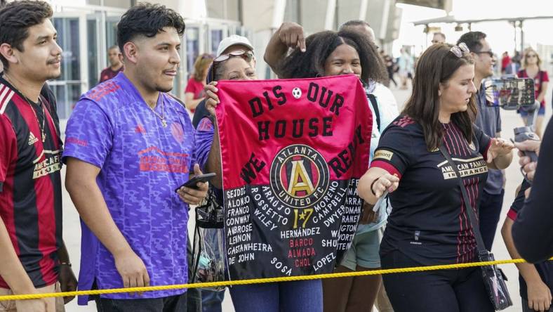 May 28, 2022; Atlanta, Georgia, USA; Atlanta United fans wait to greet their players on the way into the stadium before the match against the Columbus Crew at Mercedes-Benz Stadium. Mandatory Credit: Dale Zanine-USA TODAY Sports
