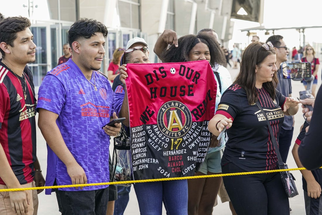 May 28, 2022; Atlanta, Georgia, USA; Atlanta United fans wait to greet their players on the way into the stadium before the match against the Columbus Crew at Mercedes-Benz Stadium. Mandatory Credit: Dale Zanine-USA TODAY Sports
