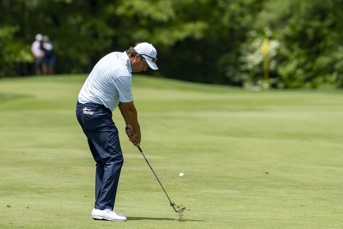 May 29, 2022; Benton Harbor, Michigan, USA; Stephen Ames hits his approach shot from the first fairway during the final round of the 2022 KitchenAid Senior PGA Championship at Harbor Shores. Mandatory Credit: Raj Mehta-USA TODAY Sports