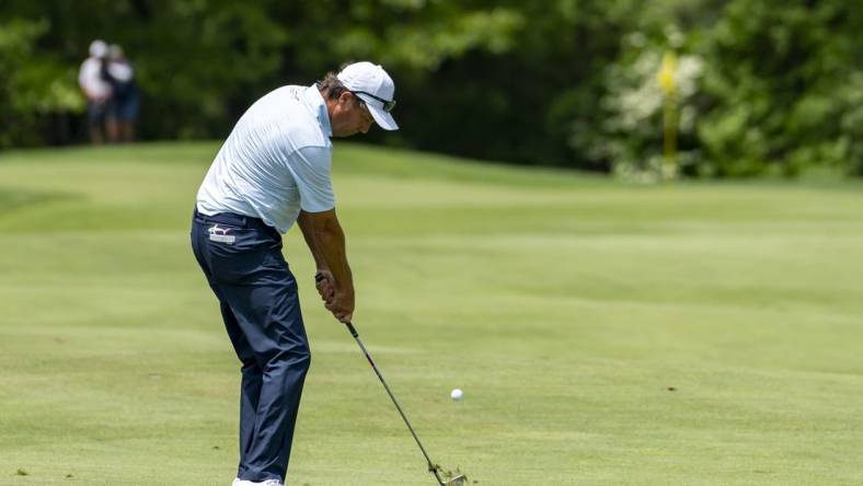 May 29, 2022; Benton Harbor, Michigan, USA; Stephen Ames hits his approach shot from the first fairway during the final round of the 2022 KitchenAid Senior PGA Championship at Harbor Shores. Mandatory Credit: Raj Mehta-USA TODAY Sports