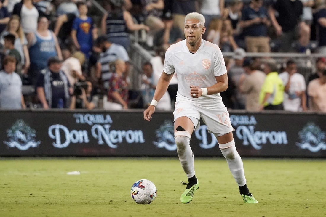 May 28, 2022; Kansas City, Kansas, USA; Sporting Kansas City defender Kortne Ford (12) controls the ball against the Vancouver Whitecaps during the match at Children's Mercy Park. Mandatory Credit: Denny Medley-USA TODAY Sports