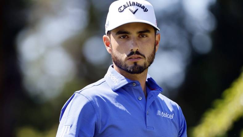 Jul 1, 2022; Portland, Oregon, USA; Abraham Ancer and look on from the sixth tee box during the second round of the LIV Golf tournament at Pumpkin Ridge Golf Club. Mandatory Credit: Soobum Im-USA TODAY Sports