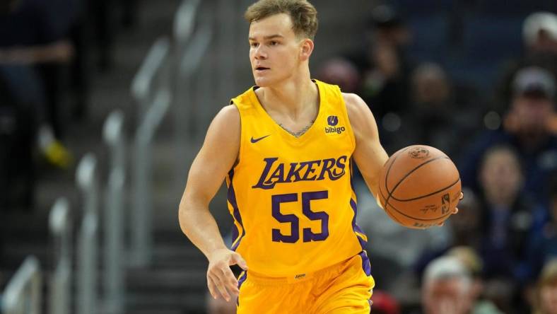 Jul 2, 2022; San Francisco, CA, USA; Los Angeles Lakers guard Mac McClung (55) dribbles against the Miami Heat during the fourth quarter at the California Summer League at Chase Center. Mandatory Credit: Darren Yamashita-USA TODAY Sports