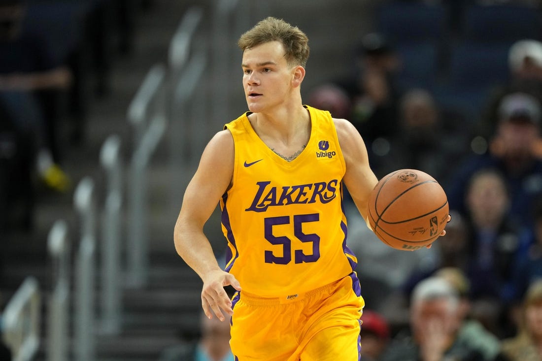 Jul 2, 2022; San Francisco, CA, USA; Los Angeles Lakers guard Mac McClung (55) dribbles against the Miami Heat during the fourth quarter at the California Summer League at Chase Center. Mandatory Credit: Darren Yamashita-USA TODAY Sports