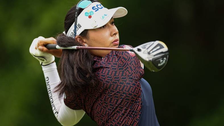 Jun 23, 2022; Bethesda, Maryland, USA; Atthaya Thitikul plays her shot from the 11th tee during the first round of the KPMG Women's PGA Championship golf tournament at Congressional Country Club. Mandatory Credit: Scott Taetsch-USA TODAY Sports