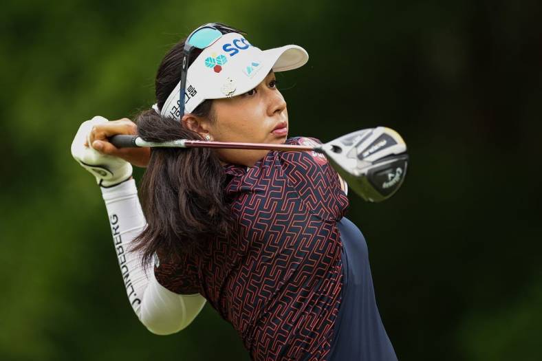 Jun 23, 2022; Bethesda, Maryland, USA; Atthaya Thitikul plays her shot from the 11th tee during the first round of the KPMG Women's PGA Championship golf tournament at Congressional Country Club. Mandatory Credit: Scott Taetsch-USA TODAY Sports