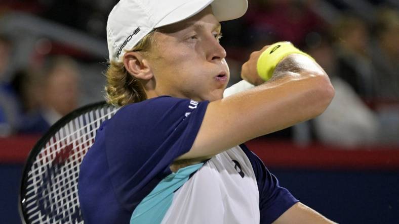 Aug 9, 2022; Montreal, QC, Canada; Emil Ruusuvuori (FIN) hits a forehand against Hubert Hurkacz (POL) (not pictured) in second round play in the National Bank Open at IGA Stadium. Mandatory Credit: Eric Bolte-USA TODAY Sports