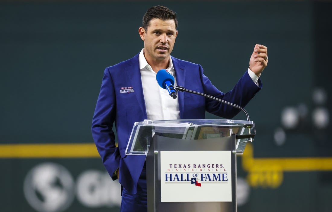 Aug 13, 2022; Arlington, Texas, USA;  Texas Rangers former player Ian Kinsler gives a speech after being inducted into the Texas Rangers hall of fame before the game against the Seattle Mariners at Globe Life Field. Mandatory Credit: Kevin Jairaj-USA TODAY Sports