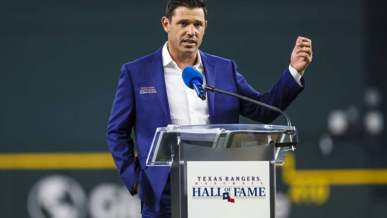 Aug 13, 2022; Arlington, Texas, USA;  Texas Rangers former player Ian Kinsler gives a speech after being inducted into the Texas Rangers hall of fame before the game against the Seattle Mariners at Globe Life Field. Mandatory Credit: Kevin Jairaj-USA TODAY Sports