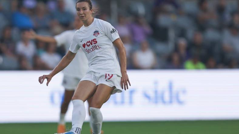 Aug 5, 2022; Louisville, Kentucky, USA;  Washington Spirit midfielder Dorian Bailey (19) passes the ball during the first half against Racing Louisville FC at Lynn Family Stadium. Mandatory Credit: EM Dash-USA TODAY Sports