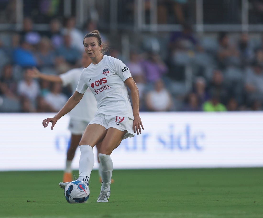 Aug 5, 2022; Louisville, Kentucky, USA;  Washington Spirit midfielder Dorian Bailey (19) passes the ball during the first half against Racing Louisville FC at Lynn Family Stadium. Mandatory Credit: EM Dash-USA TODAY Sports