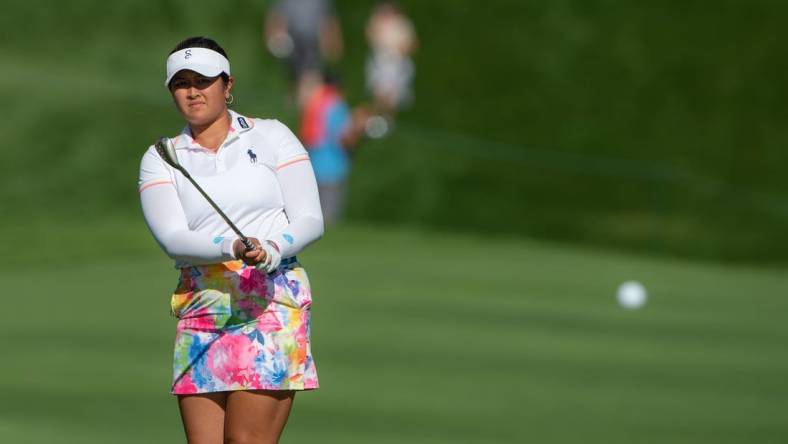 Aug 27, 2022; Ottawa, Ontario, CAN; Lilia Vu from the United States  follows the ball as she gets it onto the green of the 18th hole during the third round of the CP Women's Open golf tournament. Mandatory Credit: Marc DesRosiers-USA TODAY Sports