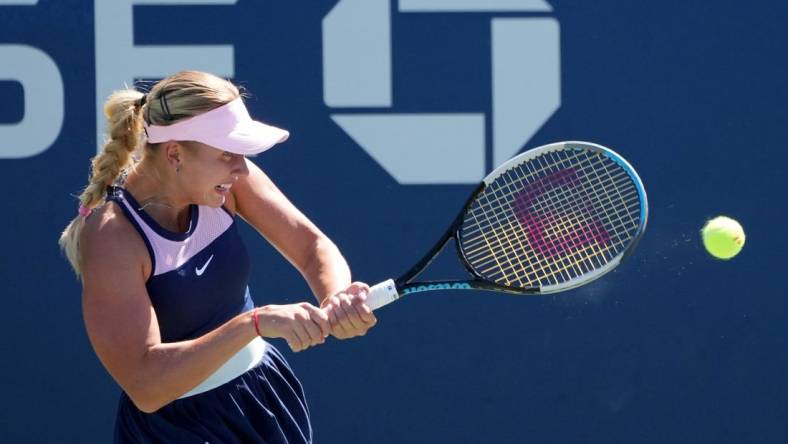 Sep 1, 2022; Flushing, NY, USA;  Anastasia Potapova hits the ball against Qinwen Zheng of China on day four of the 2022 U.S. Open tennis tournament at USTA Billie Jean King Tennis Center. Mandatory Credit: Jerry Lai-USA TODAY Sports