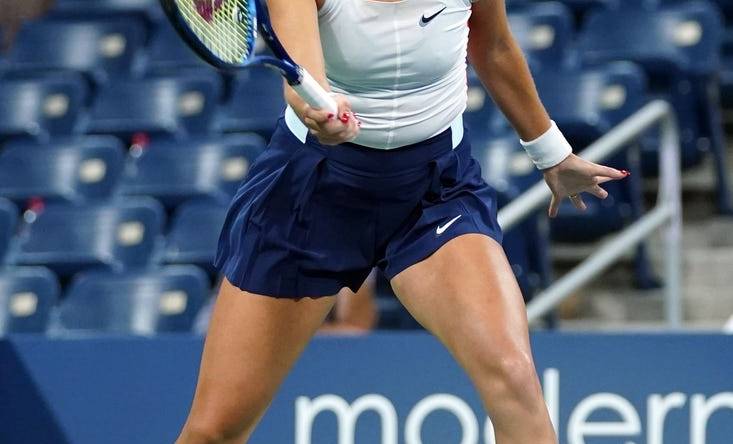 Sep 3, 2022; Flushing, NY, USA; Belinda Bencic of Switzerland hits to Karolina Pliskova of Czech Republic on day six of the 2022 U.S. Open tennis tournament at USTA Billie Jean King Tennis Center. Mandatory Credit: Danielle Parhizkaran-USA TODAY Sports