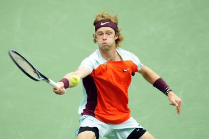 Sep 7, 2022; Flushing, NY, USA; Andrey Rublev hits to Frances Tiafoe of the United States on day ten of the 2022 U.S. Open tennis tournament at USTA Billie Jean King Tennis Center. Mandatory Credit: Danielle Parhizkaran-USA TODAY Sports