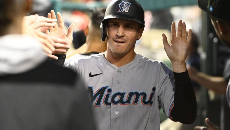 Sep 16, 2022; Washington, District of Columbia, USA; Miami Marlins center fielder JJ Bleday (67) is congratulated by teammates after scoring a run against the Washington Nationals during the second inning at Nationals Park. Mandatory Credit: Brad Mills-USA TODAY Sports