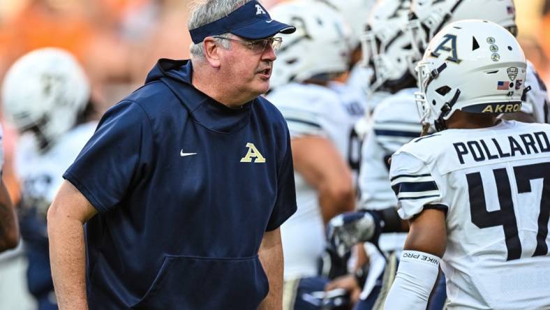 Sep 17, 2022; Knoxville, Tennessee, USA; Akron Zips head coach Joe Moorhead coaching during warmups before the game against the Tennessee Volunteers at Neyland Stadium. Mandatory Credit: Bryan Lynn-USA TODAY Sports