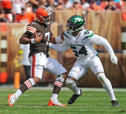 Browns quarterback Jacoby Brissett scrambles to get away from New York Jets lineman Jacob Martin on Sunday, Sept. 18, 2022 in Cleveland.

Akr 9 18 Browns 17