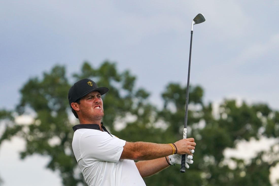 Sep 22, 2022; Charlotte, North Carolina, USA; International Team golfer Mito Pereira hits his tee shot on the 14th hole during the foursomes match play of the Presidents Cup golf tournament at Quail Hollow Club. Mandatory Credit: Peter Casey-USA TODAY Sports