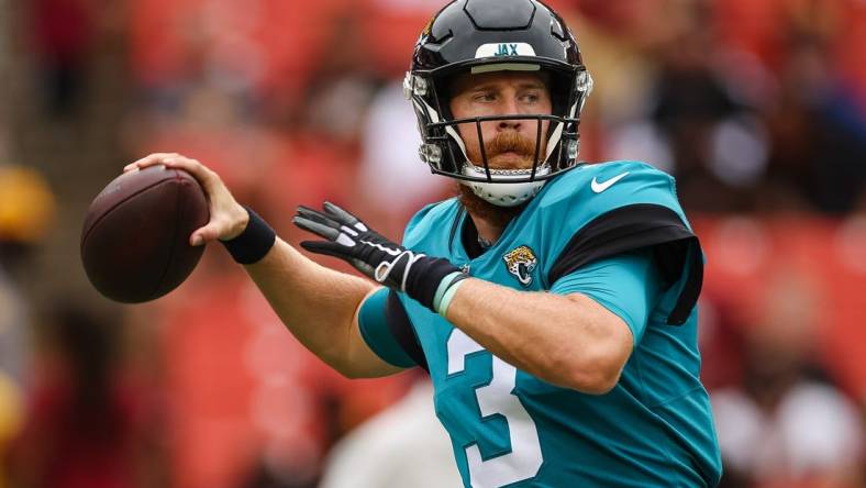 Sep 11, 2022; Landover, Maryland, USA; Jacksonville Jaguars quarterback C.J. Beathard (3) warms up before the game against the Washington Commanders at FedExField. Mandatory Credit: Scott Taetsch-USA TODAY Sports