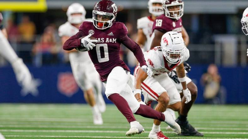 Sep 24, 2022; Arlington, Texas, USA; Texas A&M Aggies wide receiver Ainias Smith (0) makes a catch during the third quarter against the Arkansas Razorbacks at AT&T Stadium. Mandatory Credit: Andrew Dieb-USA TODAY Sports