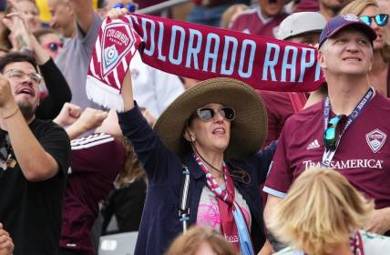 Oct 1, 2022; Commerce City, Colorado, USA; Colorado Rapids fans cheer following a goal in the second half against FC Dallas at Dick's Sporting Goods Park. Mandatory Credit: Ron Chenoy-USA TODAY Sports