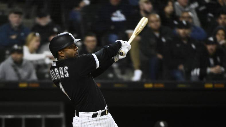 Oct 4, 2022; Chicago, Illinois, USA; Chicago White Sox shortstop Elvis Andrus (1) singles against the Minnesota Twins during the third inning at Guaranteed Rate Field. Mandatory Credit: Matt Marton-USA TODAY Sports