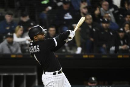 Oct 4, 2022; Chicago, Illinois, USA; Chicago White Sox shortstop Elvis Andrus (1) singles against the Minnesota Twins during the third inning at Guaranteed Rate Field. Mandatory Credit: Matt Marton-USA TODAY Sports