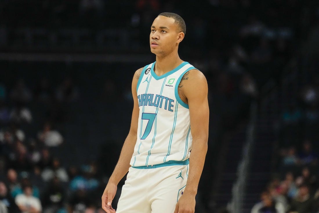 Oct 10, 2022; Charlotte, North Carolina, USA; Charlotte Hornets guard Bryce McGowens (7) enters the game during the second quarter against the Washington Wizards at Spectrum Center. Mandatory Credit: Jim Dedmon-USA TODAY Sports