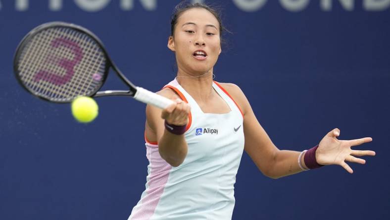 Oct 13, 2022; San Diego, California, US;  Qinwen Zheng of China hits the ball against Iga Swiatek of Poland during the San Diego Open at Barnes Tennis Center. Mandatory Credit: Ray Acevedo-USA TODAY Sports