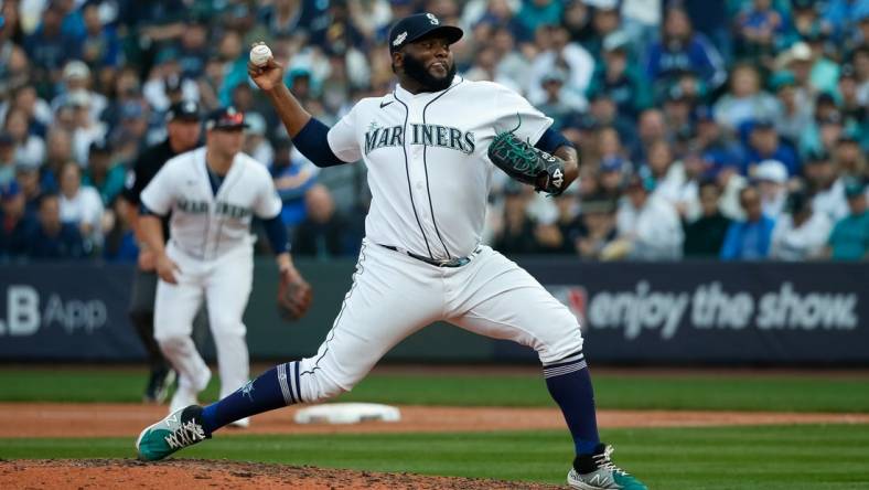 Oct 15, 2022; Seattle, Washington, USA; Seattle Mariners relief pitcher Diego Castillo (63) pitches in the ninth inning against the Houston Astros during game three of the ALDS for the 2022 MLB Playoffs at T-Mobile Park. Mandatory Credit: Joe Nicholson-USA TODAY Sports