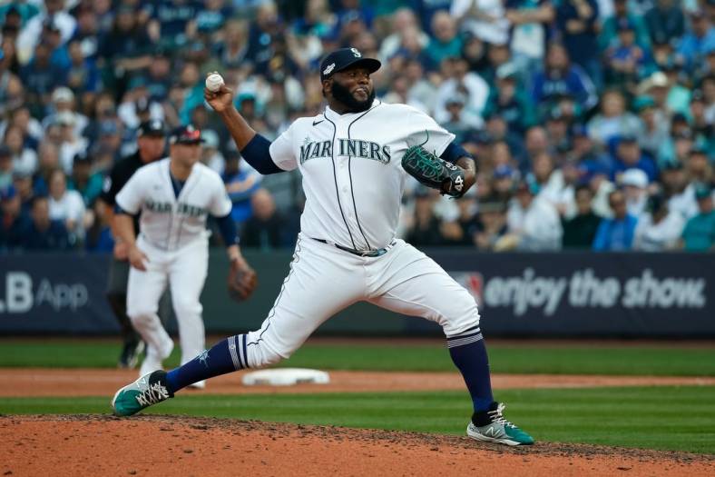Oct 15, 2022; Seattle, Washington, USA; Seattle Mariners relief pitcher Diego Castillo (63) pitches in the ninth inning against the Houston Astros during game three of the ALDS for the 2022 MLB Playoffs at T-Mobile Park. Mandatory Credit: Joe Nicholson-USA TODAY Sports