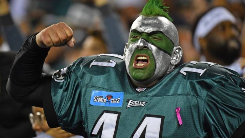 Oct 16, 2022; Philadelphia, Pennsylvania, USA; Philadelphia Eagles fan celebrates during win against the Dallas Cowboys during the fourth quarter at Lincoln Financial Field. Mandatory Credit: Eric Hartline-USA TODAY Sports