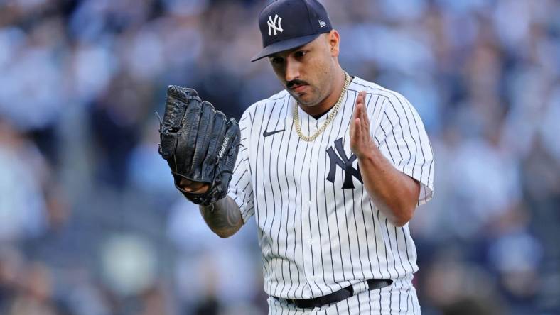 Oct 18, 2022; Bronx, New York, USA; New York Yankees starting pitcher Nestor Cortes (65) reacts after pitching against the Cleveland Guardians during the third inning in game five of the ALDS for the 2022 MLB Playoffs at Yankee Stadium. Mandatory Credit: Brad Penner-USA TODAY Sports