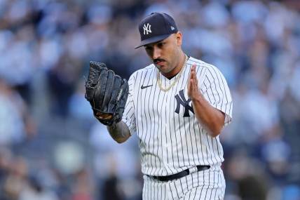 Oct 18, 2022; Bronx, New York, USA; New York Yankees starting pitcher Nestor Cortes (65) reacts after pitching against the Cleveland Guardians during the third inning in game five of the ALDS for the 2022 MLB Playoffs at Yankee Stadium. Mandatory Credit: Brad Penner-USA TODAY Sports