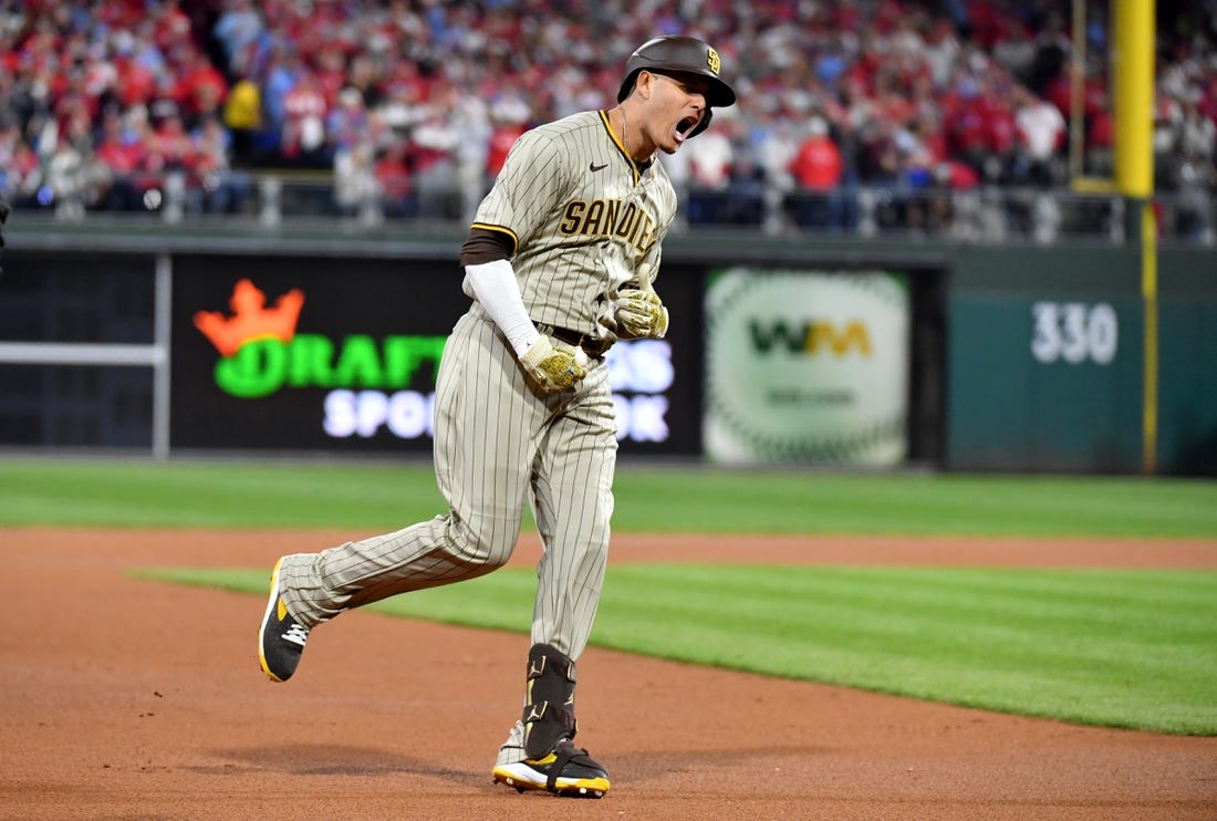 Oct 22, 2022; Philadelphia, Pennsylvania, USA; San Diego Padres third baseman Manny Machado (13) reacts after hitting a home run in the first inning during game four of the NLCS against the Philadelphia Phillies for the 2022 MLB Playoffs at Citizens Bank Park.Mandatory Credit: Eric Hartline-USA TODAY Sports