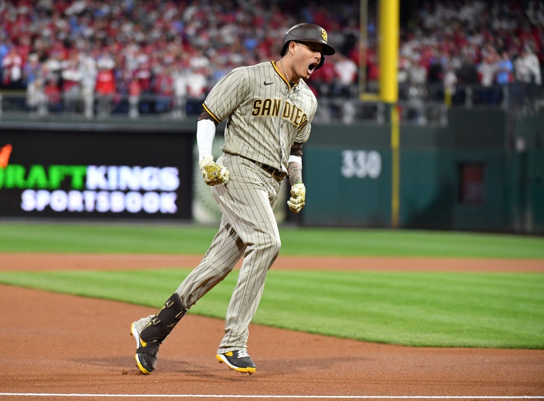 Oct 22, 2022; Philadelphia, Pennsylvania, USA; San Diego Padres third baseman Manny Machado (13) reacts after hitting a home run in the first inning during game four of the NLCS against the Philadelphia Phillies for the 2022 MLB Playoffs at Citizens Bank Park.Mandatory Credit: Eric Hartline-USA TODAY Sports