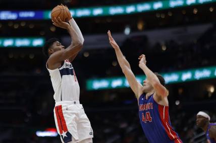 Oct 25, 2022; Washington, District of Columbia, USA; Washington Wizards forward Rui Hachimura (8) shoots the ball over Detroit Pistons forward Bojan Bogdanovic (44) in the third quarter at Capital One Arena. Mandatory Credit: Geoff Burke-USA TODAY Sports