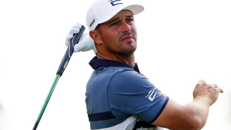 Oct 29, 2022; Miami, Florida, USA; Bryson DeChambeau plays his shot off the second tee during the second round of the season finale of the LIV Golf series at Trump National Doral. Mandatory Credit: John David Mercer-USA TODAY Sports