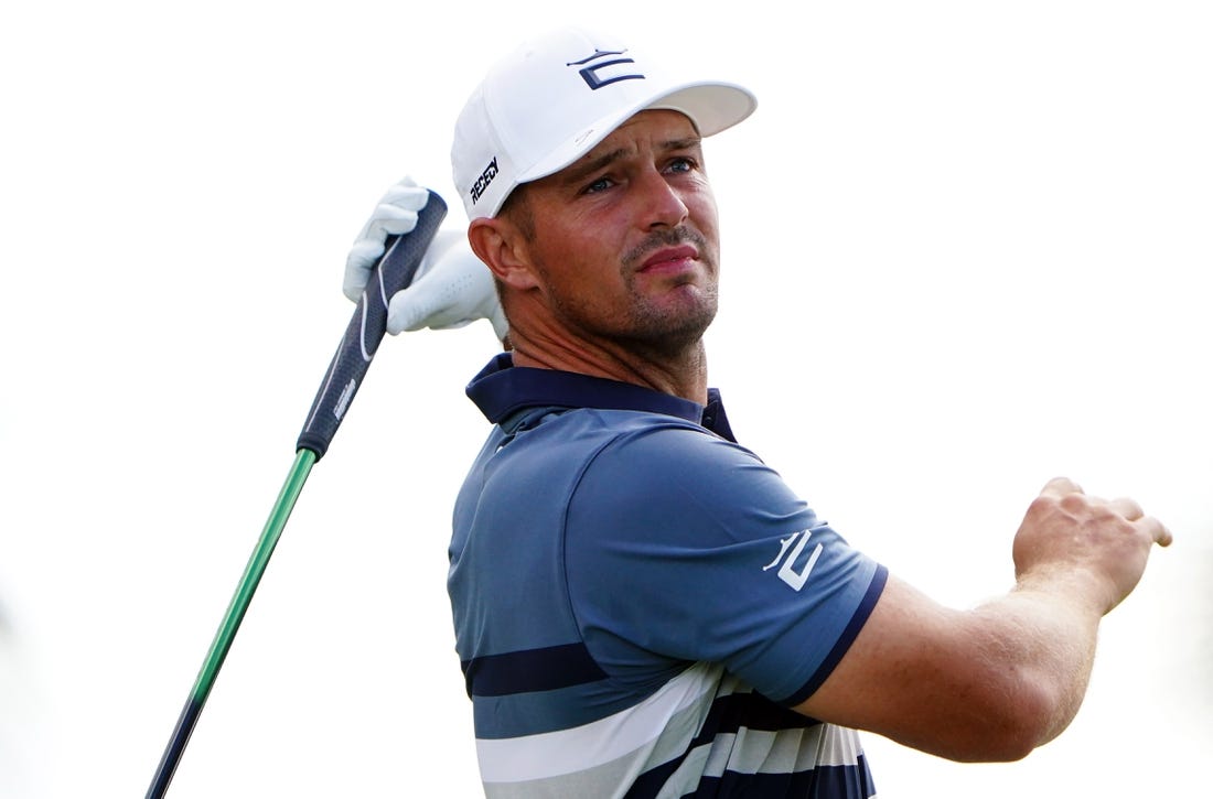 Oct 29, 2022; Miami, Florida, USA; Bryson DeChambeau plays his shot off the second tee during the second round of the season finale of the LIV Golf series at Trump National Doral. Mandatory Credit: John David Mercer-USA TODAY Sports